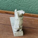 Old cast iron rabbit door wedge