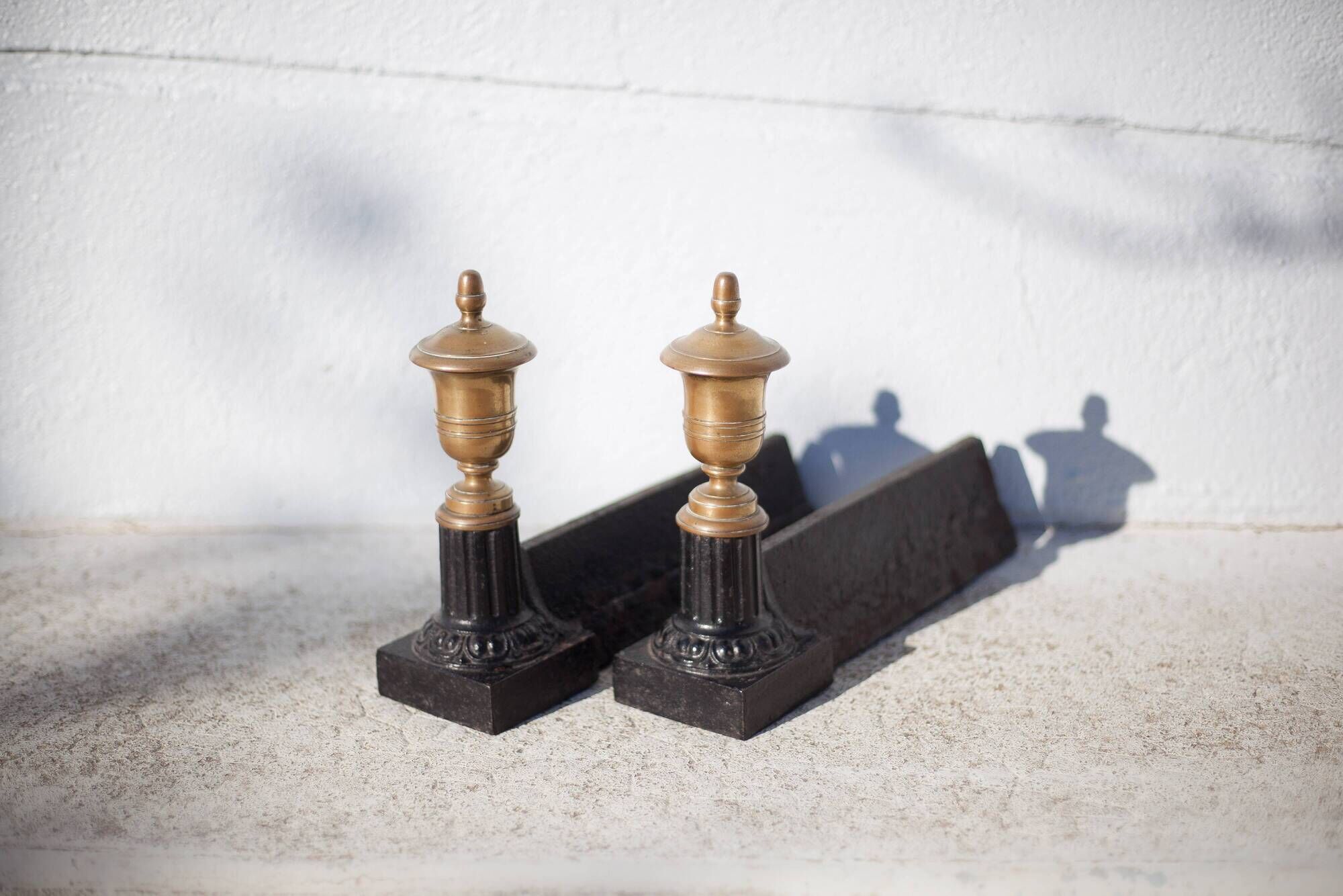 Cast iron and brass chenets
