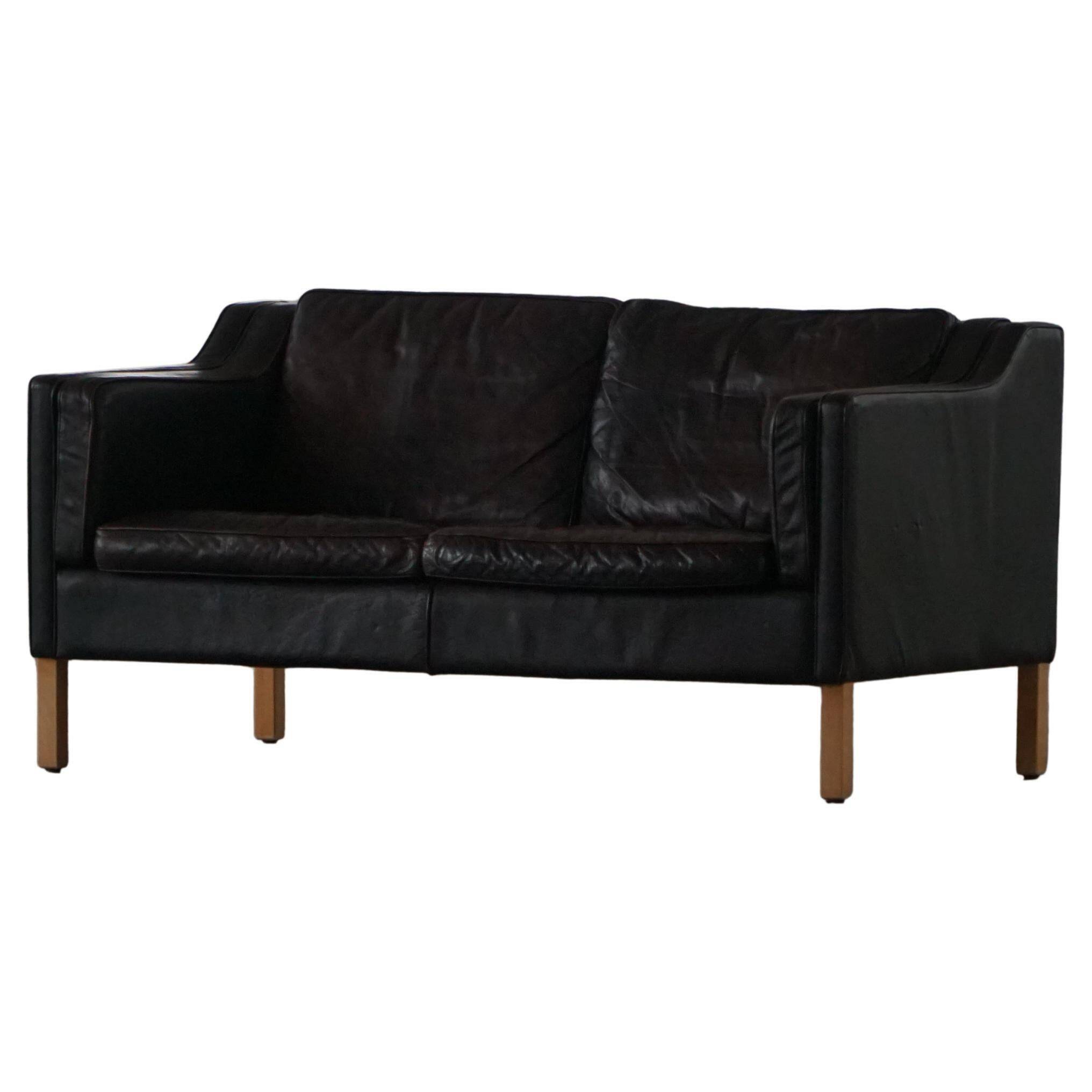 Mogens Hansen, 2-seater canapé mid-century, patinated black leather, 1970s.