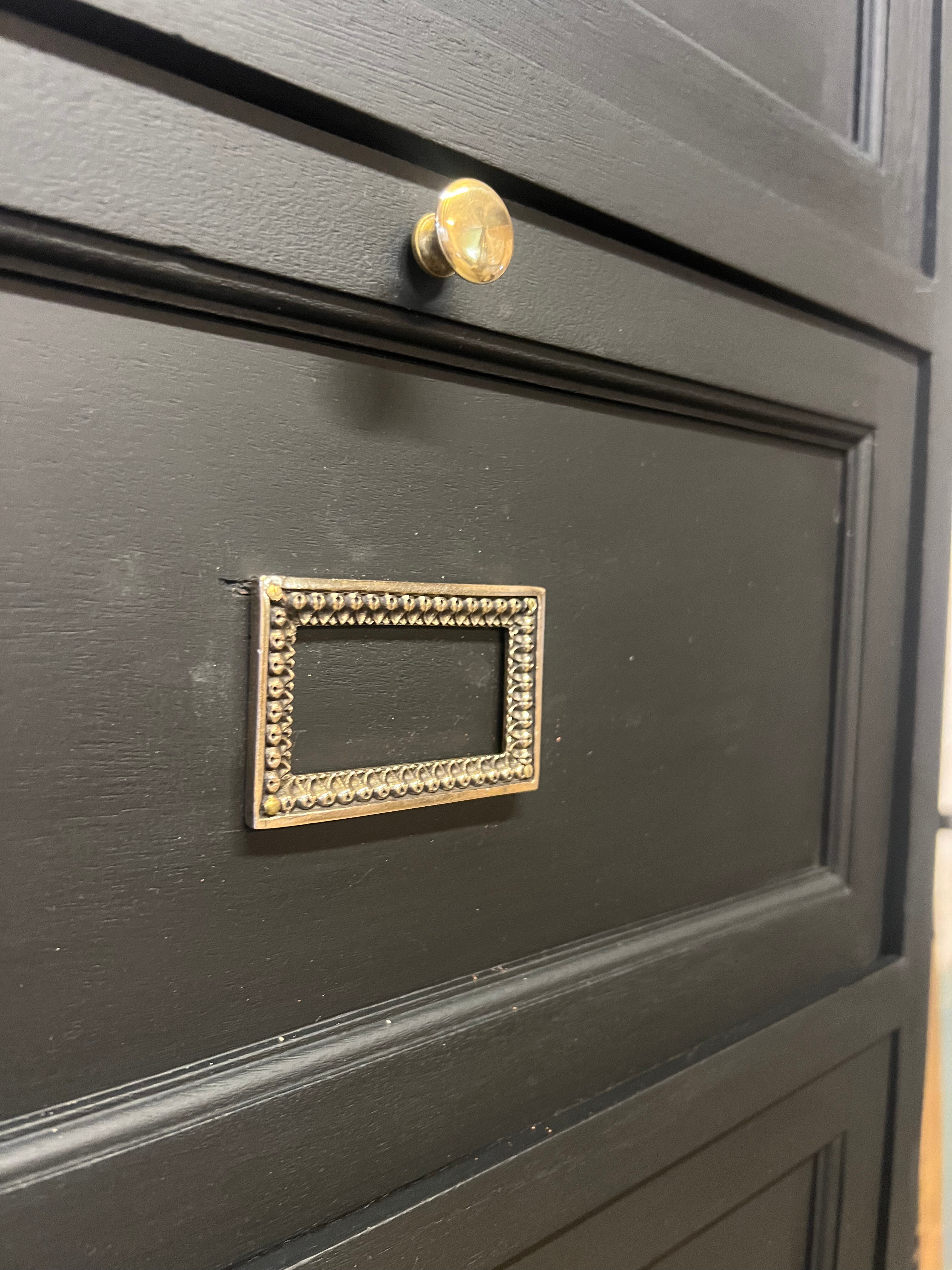 Cabinet with flaps and drawers