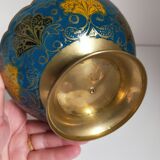 Brass cup with partitioned floral pattern chiseled contour
