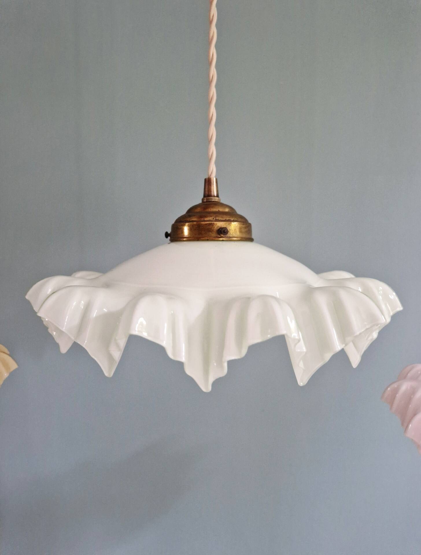 Art Deco trio of suspensions in coloured frilled opaline, 1920-30.