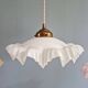 Art Deco trio of suspensions in coloured frilled opaline, 1920-30.