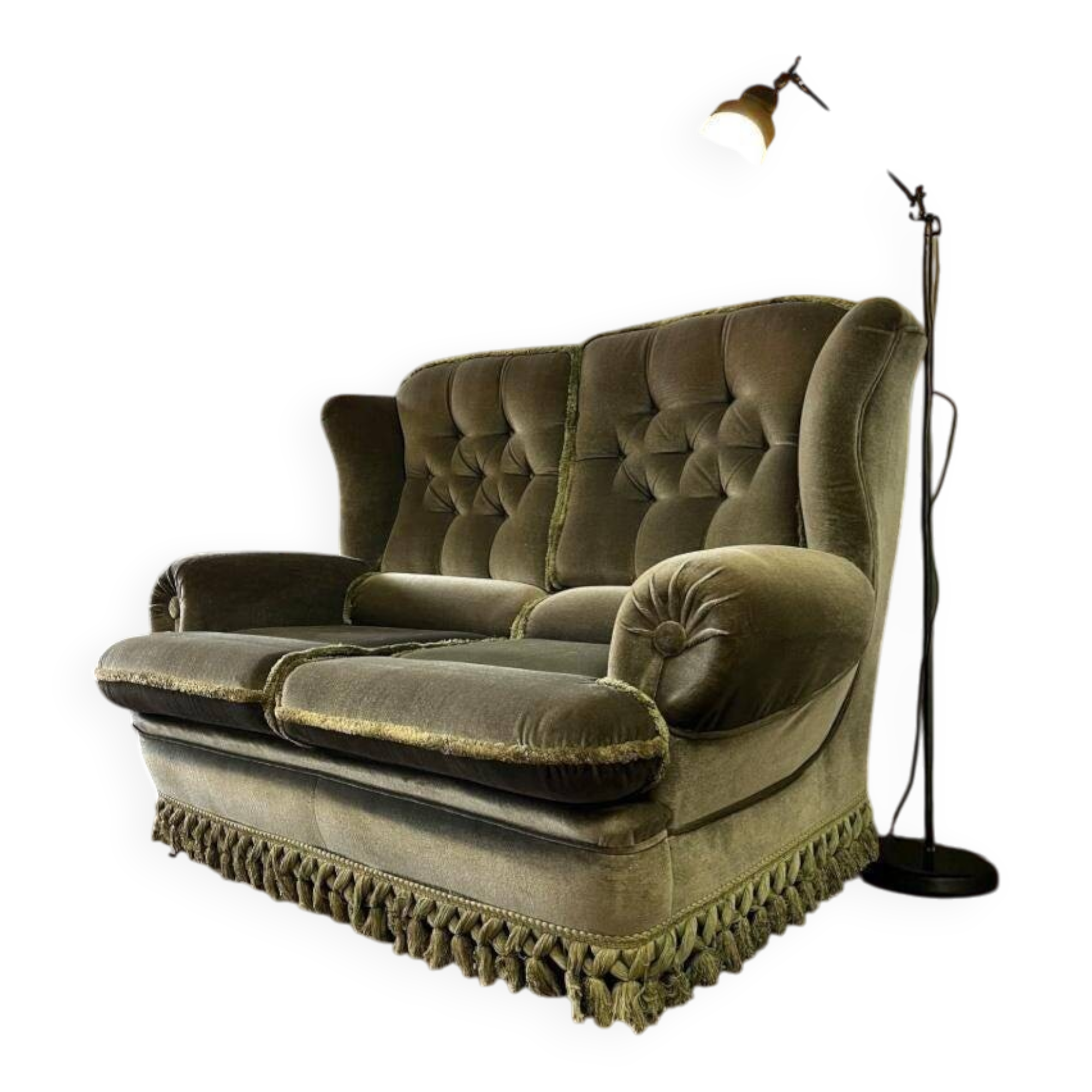 Vintage green two-seater sofa with fringes