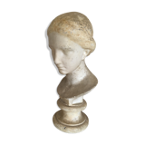 Former girl bust end 19th in plaster cast on its base