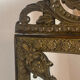 Mirror with brass repoussé frame