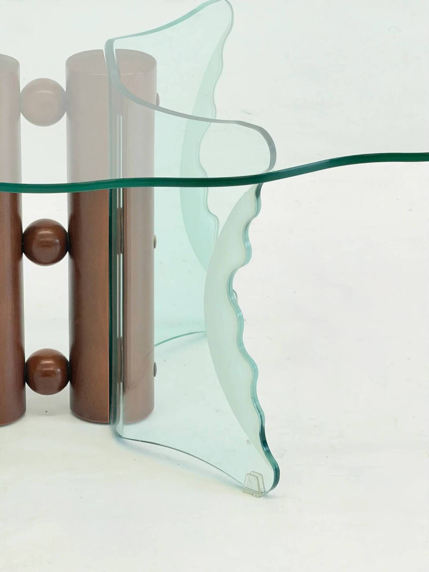 Vintage postmodern coffee table with wavy glass and wooden spheres