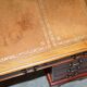 Vintage walnut desk with a leather top and two drawers.