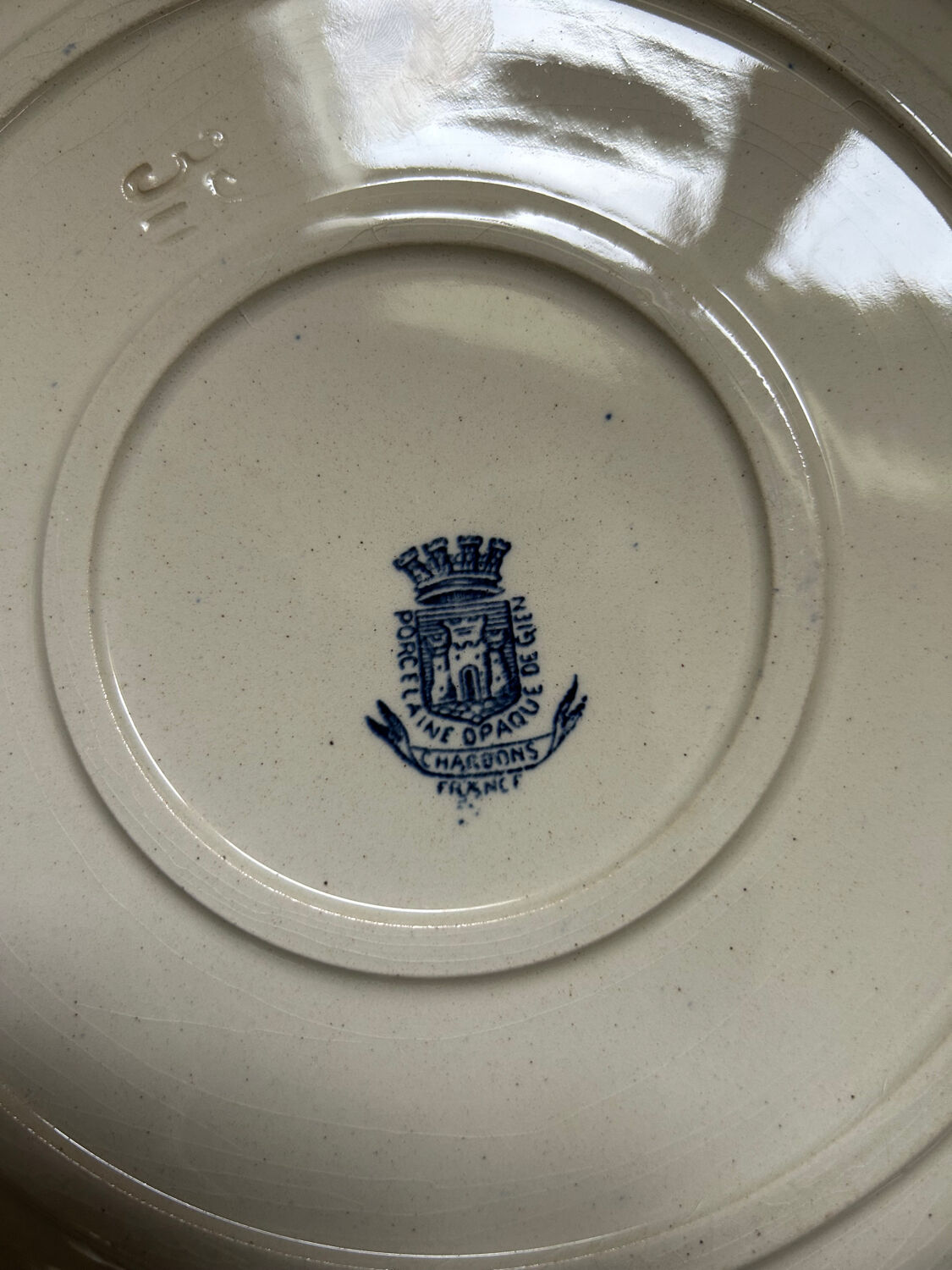 Round plate, iron earth, Gien Thistles