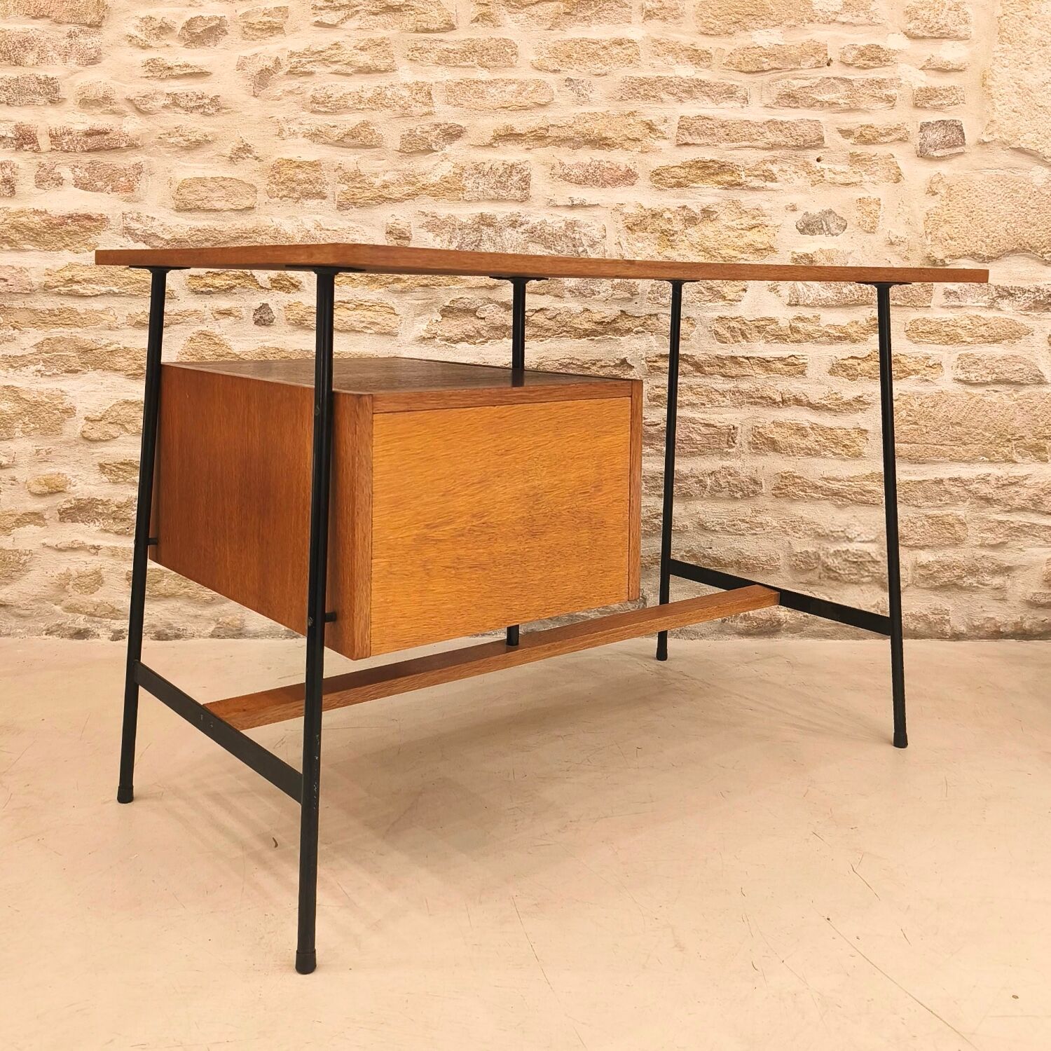 Modernist desk with suspended drawer unit, French work from the 1950s.