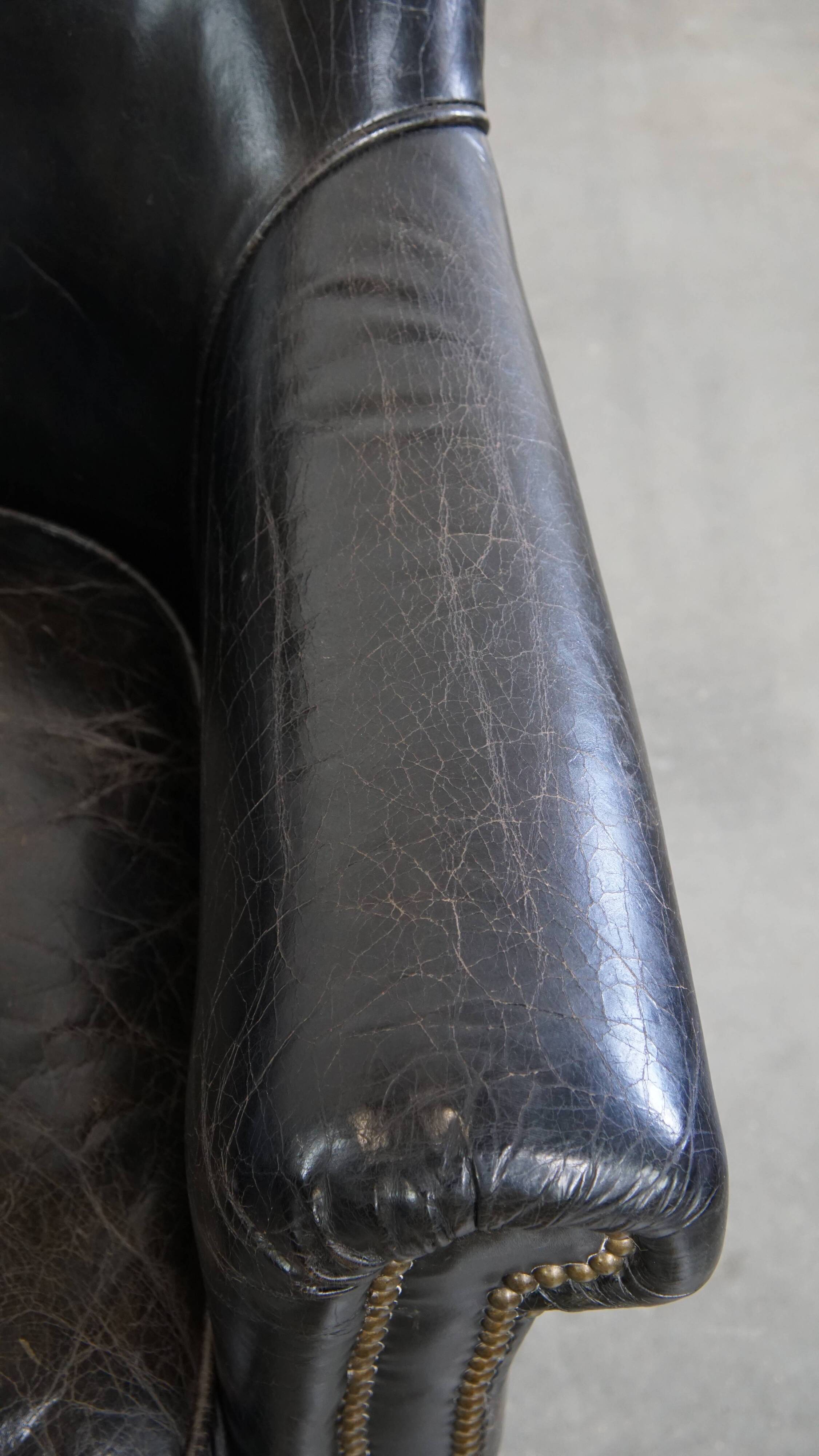 Black cowhide leather armchair