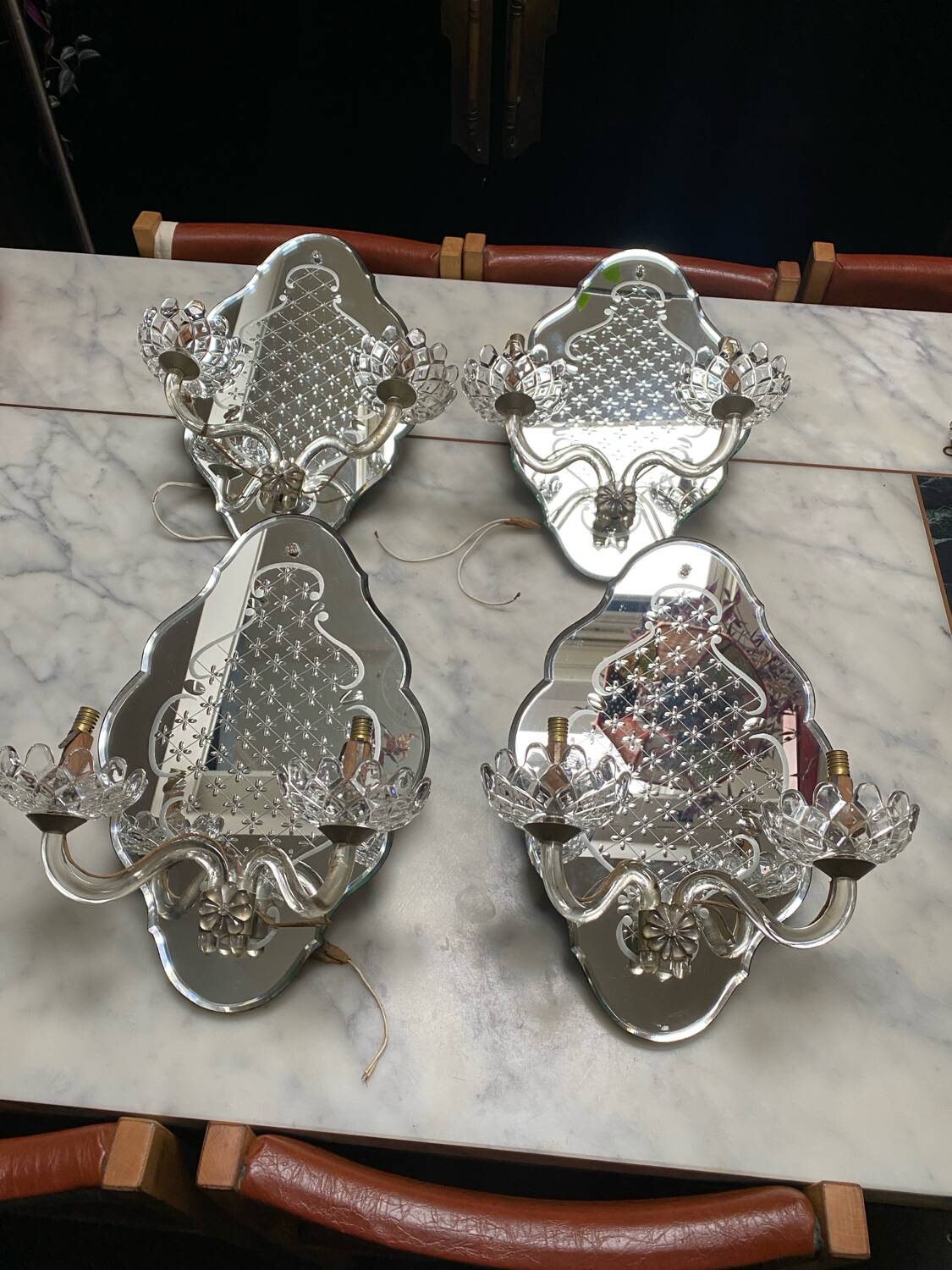 Venetian wall lights with Baccarat crystal mirror.