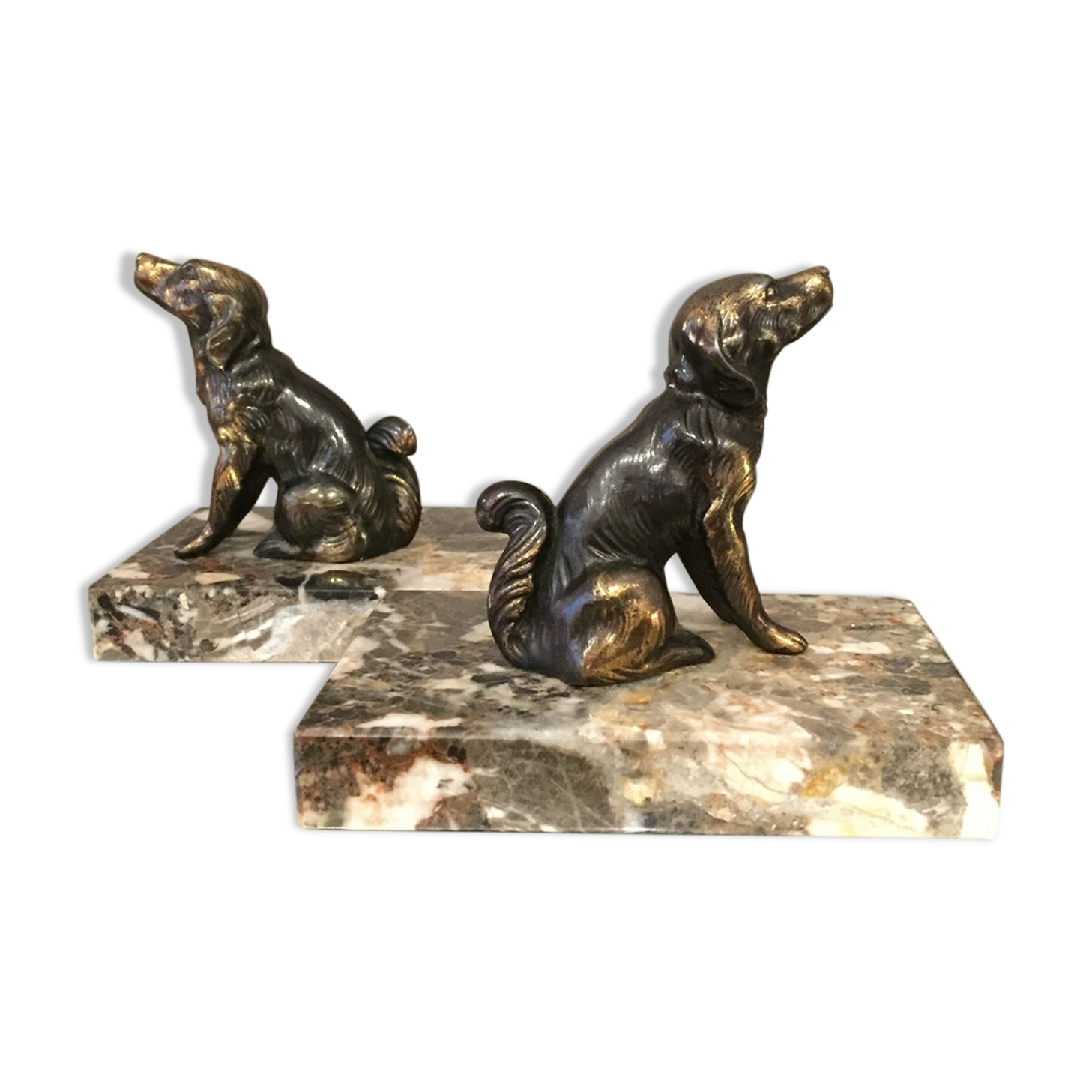 Pair of regular bookends representing dogs marble base