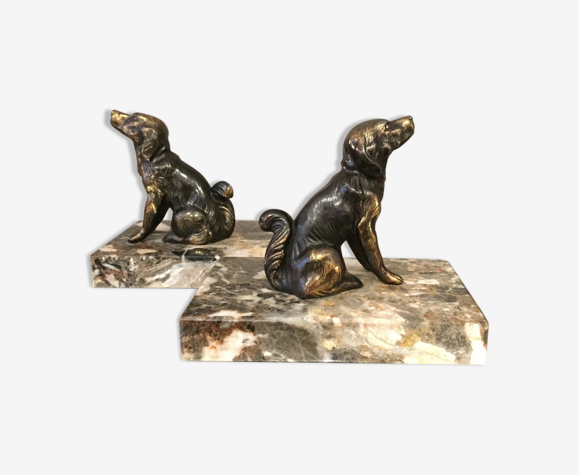 Pair of regular bookends representing dogs marble base