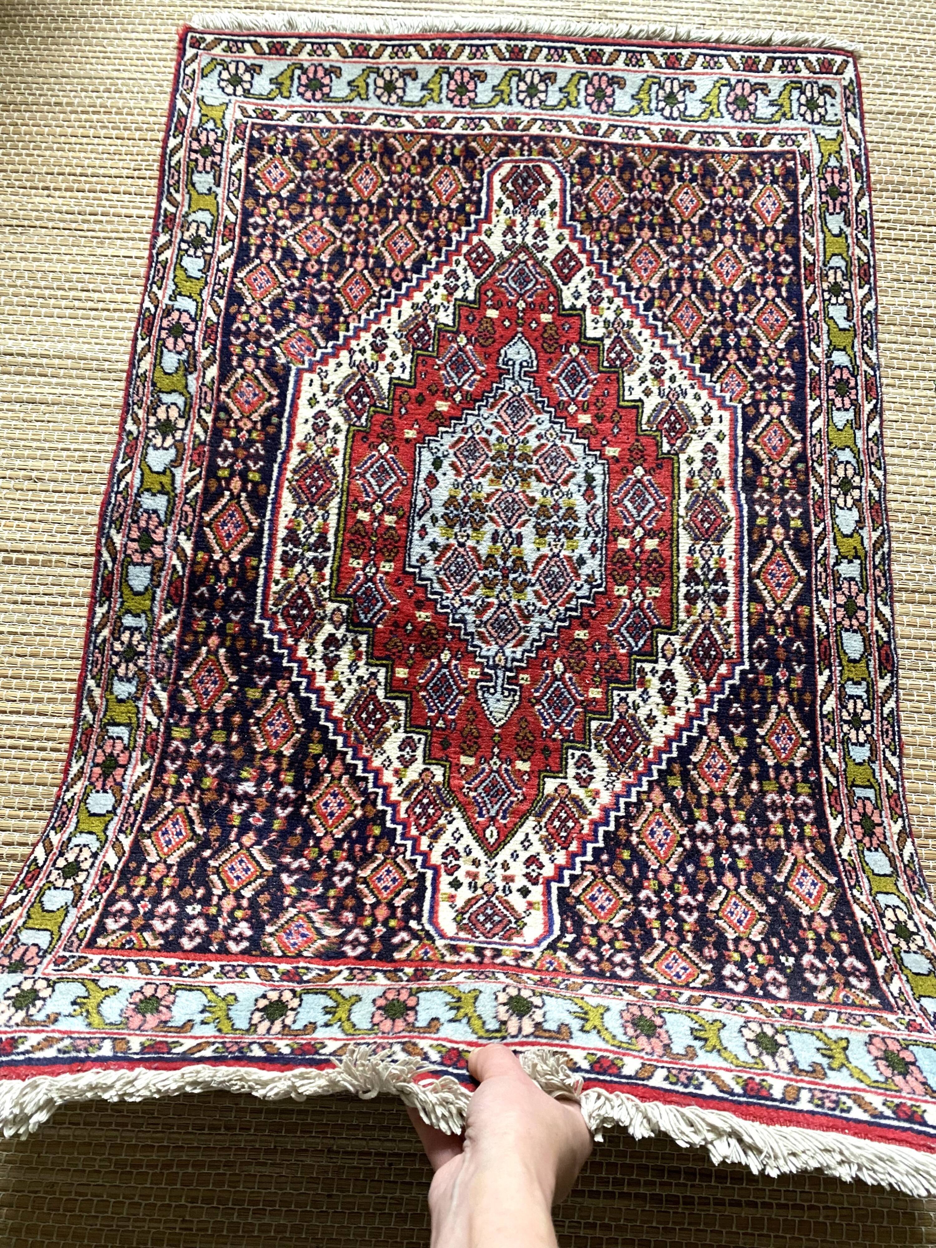 Persian wool carpet 69x113