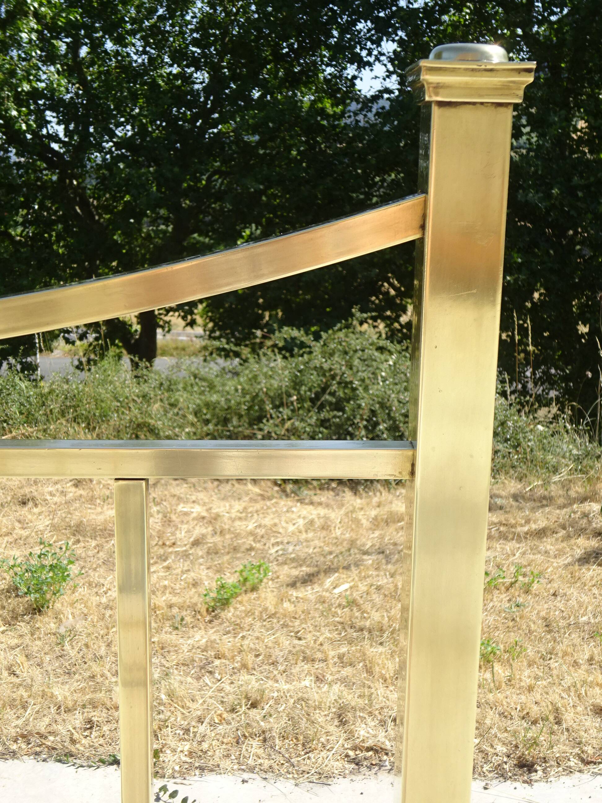 Antique gold-plated brass bed for one person.
