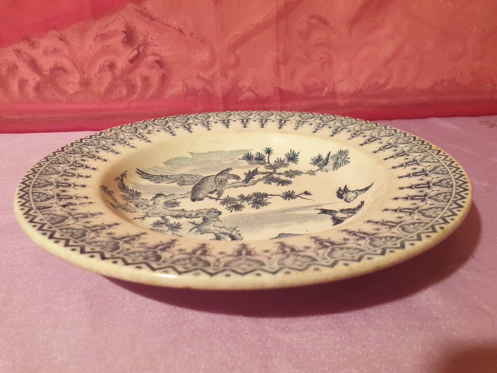 Gien earthenware ceramic soup plate with blue eagle decoration