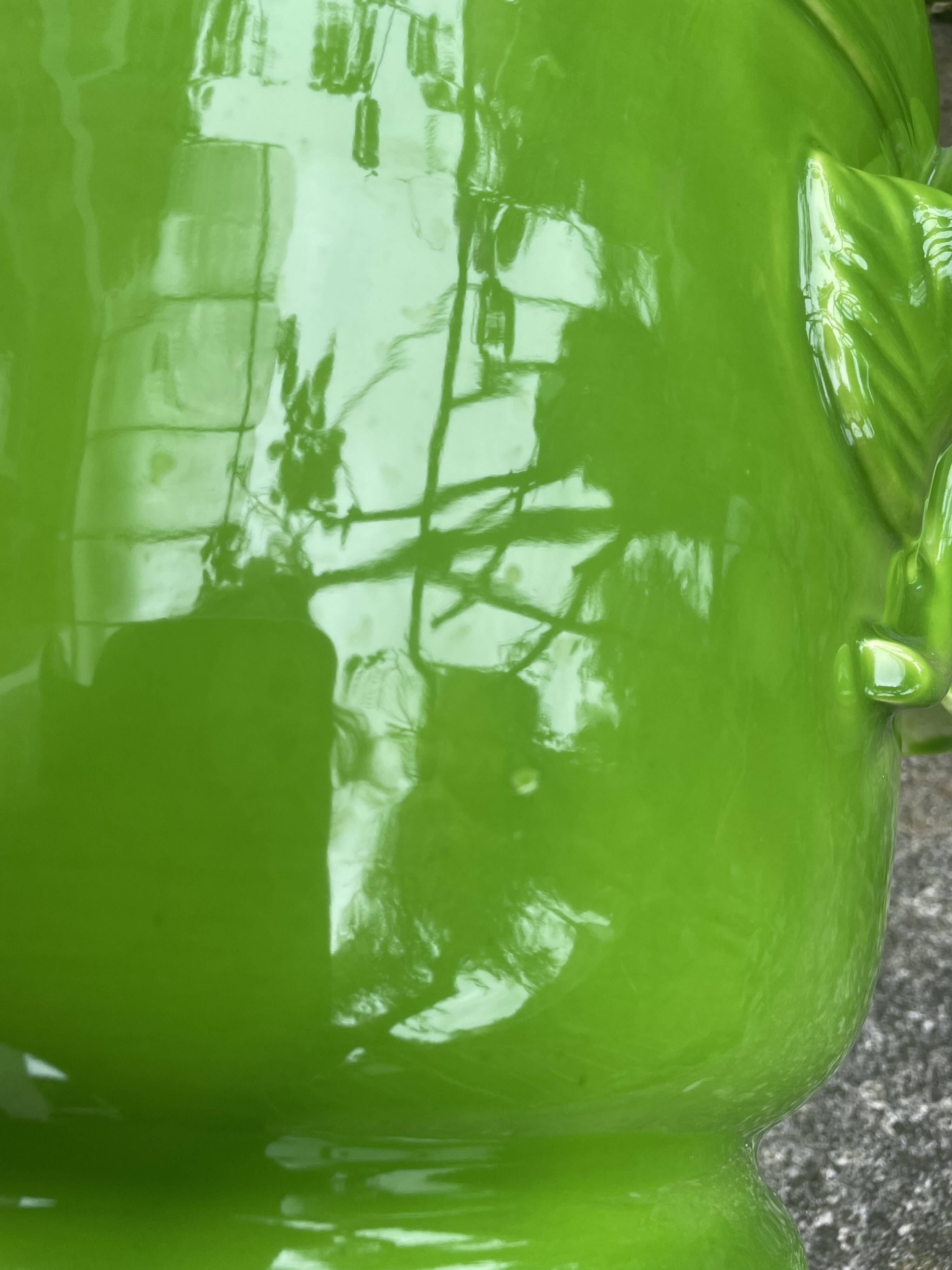 Glazed green pot cover in the style of Moreau Bourg earthenware