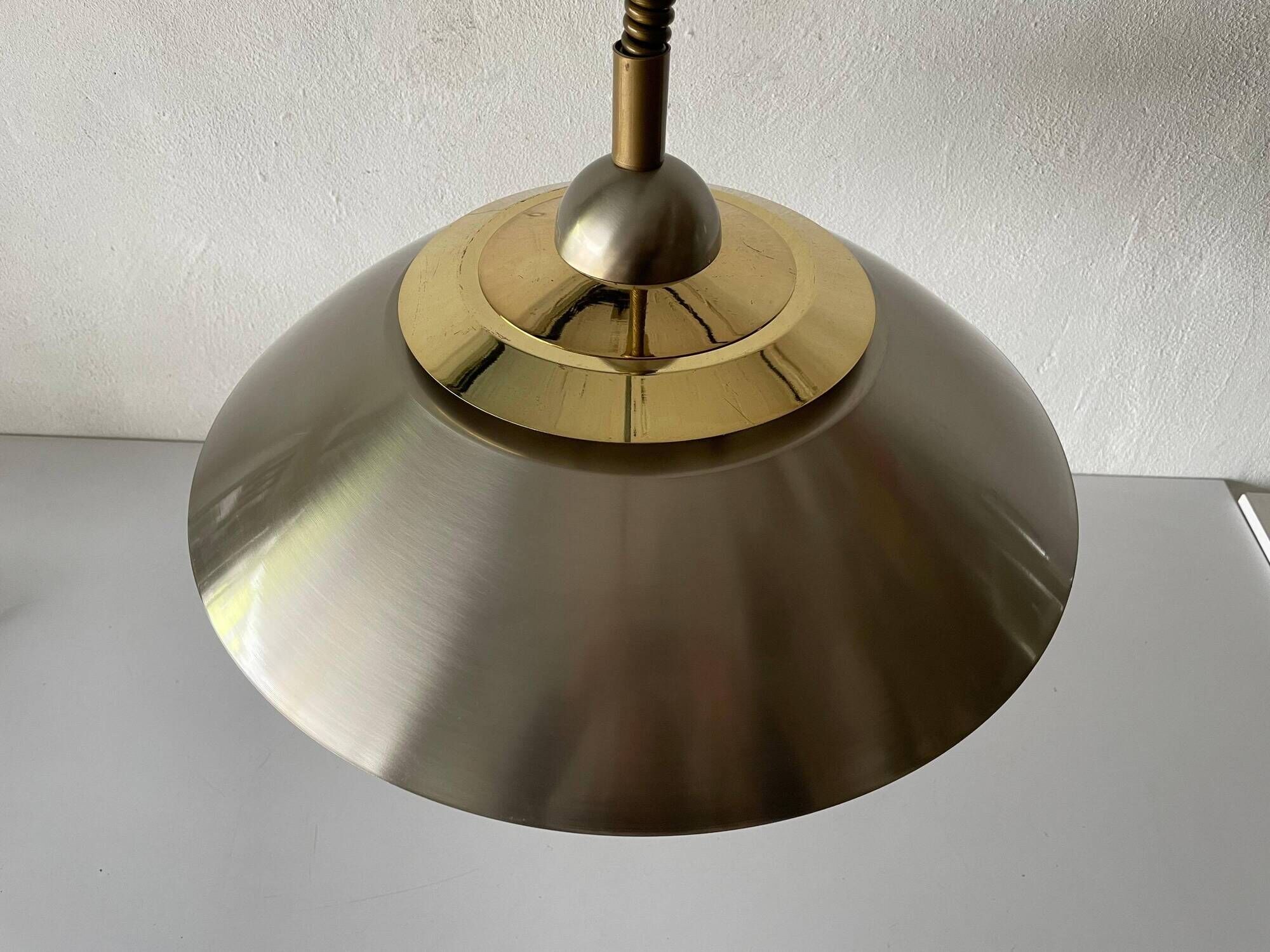 Suspended lamp in chrome and gold metal by TZ, 1970s, Germany.