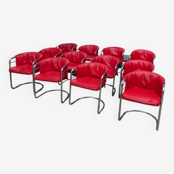 12 red skaï armchairs chrome base