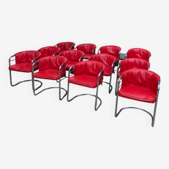 Lot de 12 fauteuils skaï rouge piétement chromé