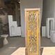 Rectangular Indonesian construction element with blue and yellow plant in carved wood