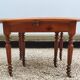 Table ovale 6 pieds avec allonges patine caramel