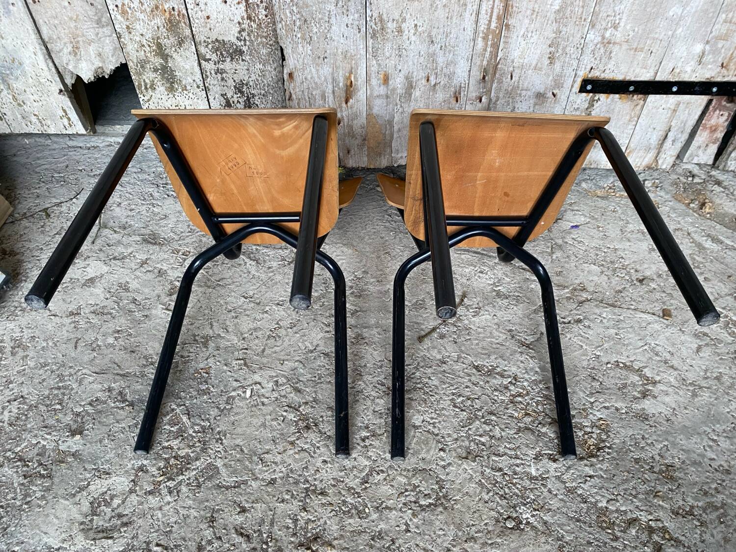 Pair of antique chairs in black metal + wooden seat & back