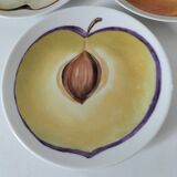5 hand-painted dessert plates with stylised fruit designs.