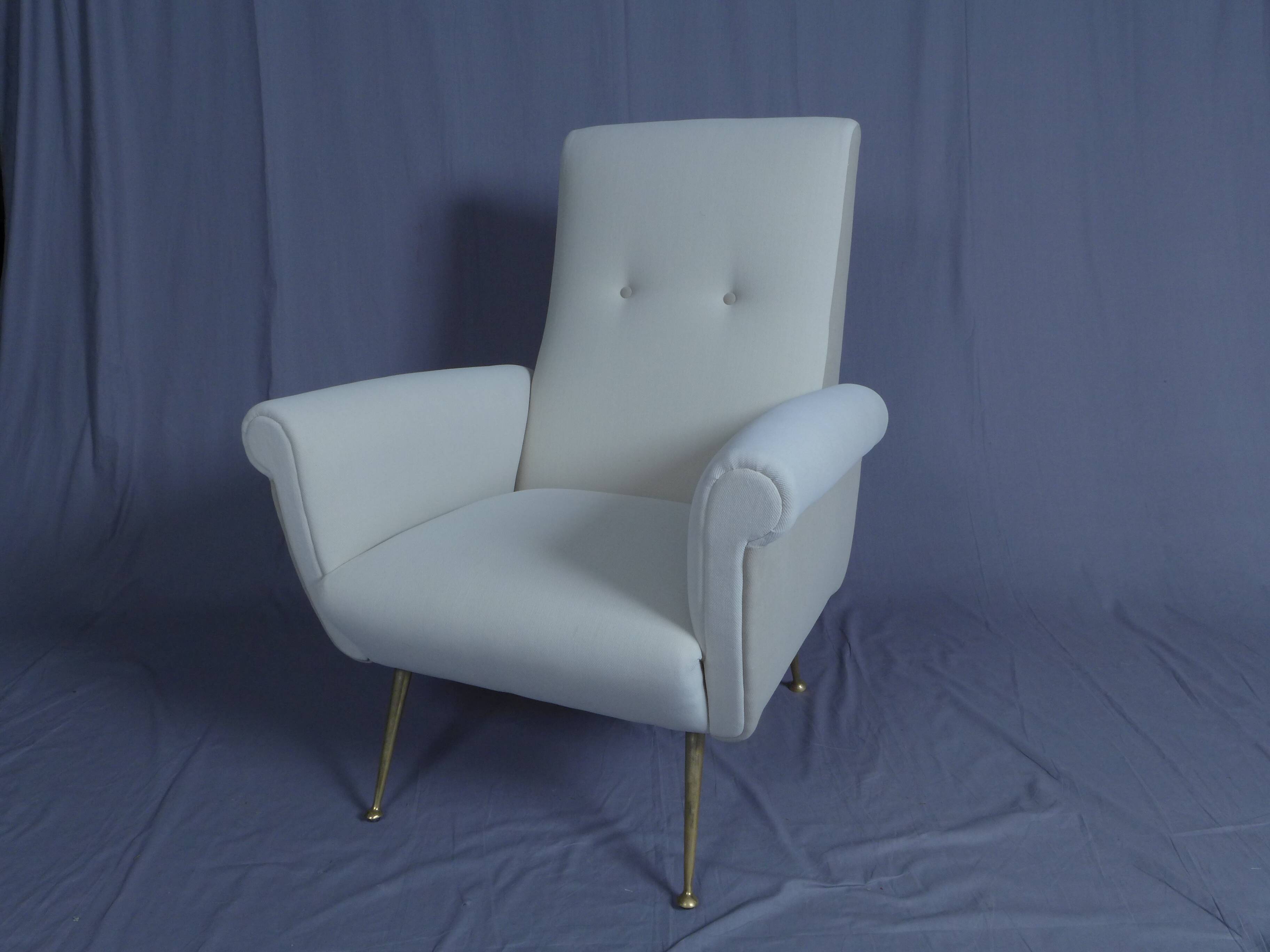 Pair of low armchairs in brass and textile. Italy 1950s