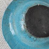 Empty turquoise raku pocket