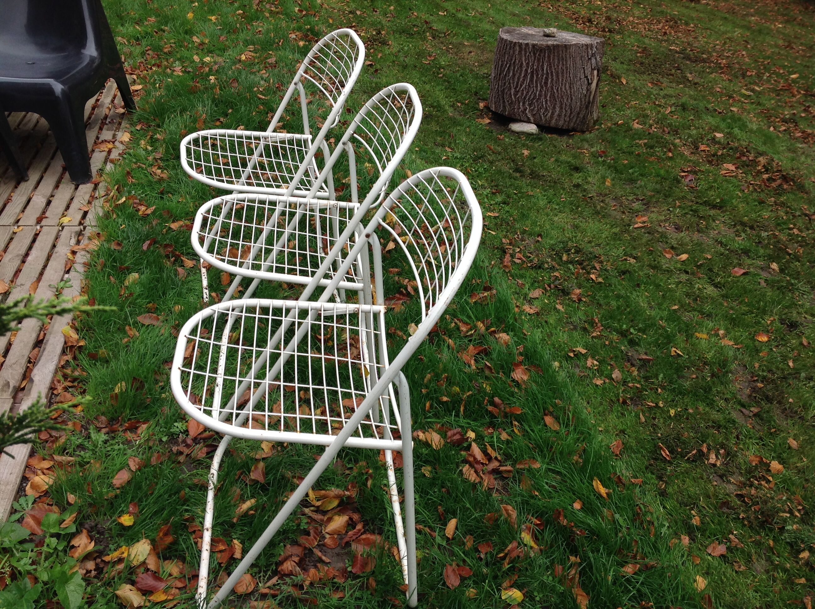 Trio of folding metal chairs