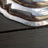 Silver metal dish with twisted edges