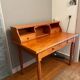 Wooden desk with drawers and storage