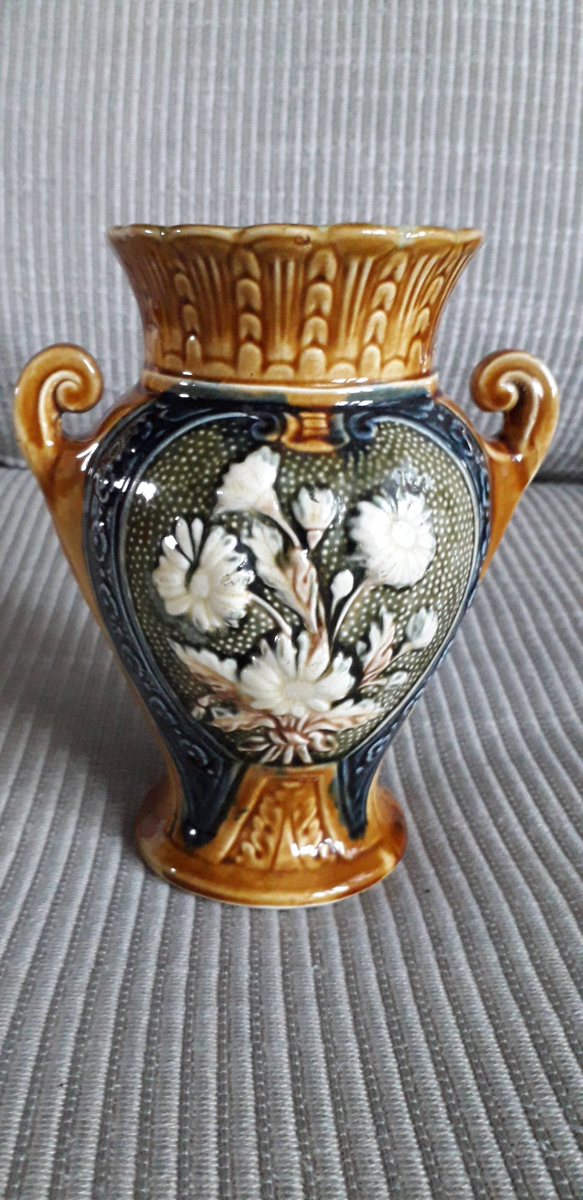 Vintage slip vase with floral decoration