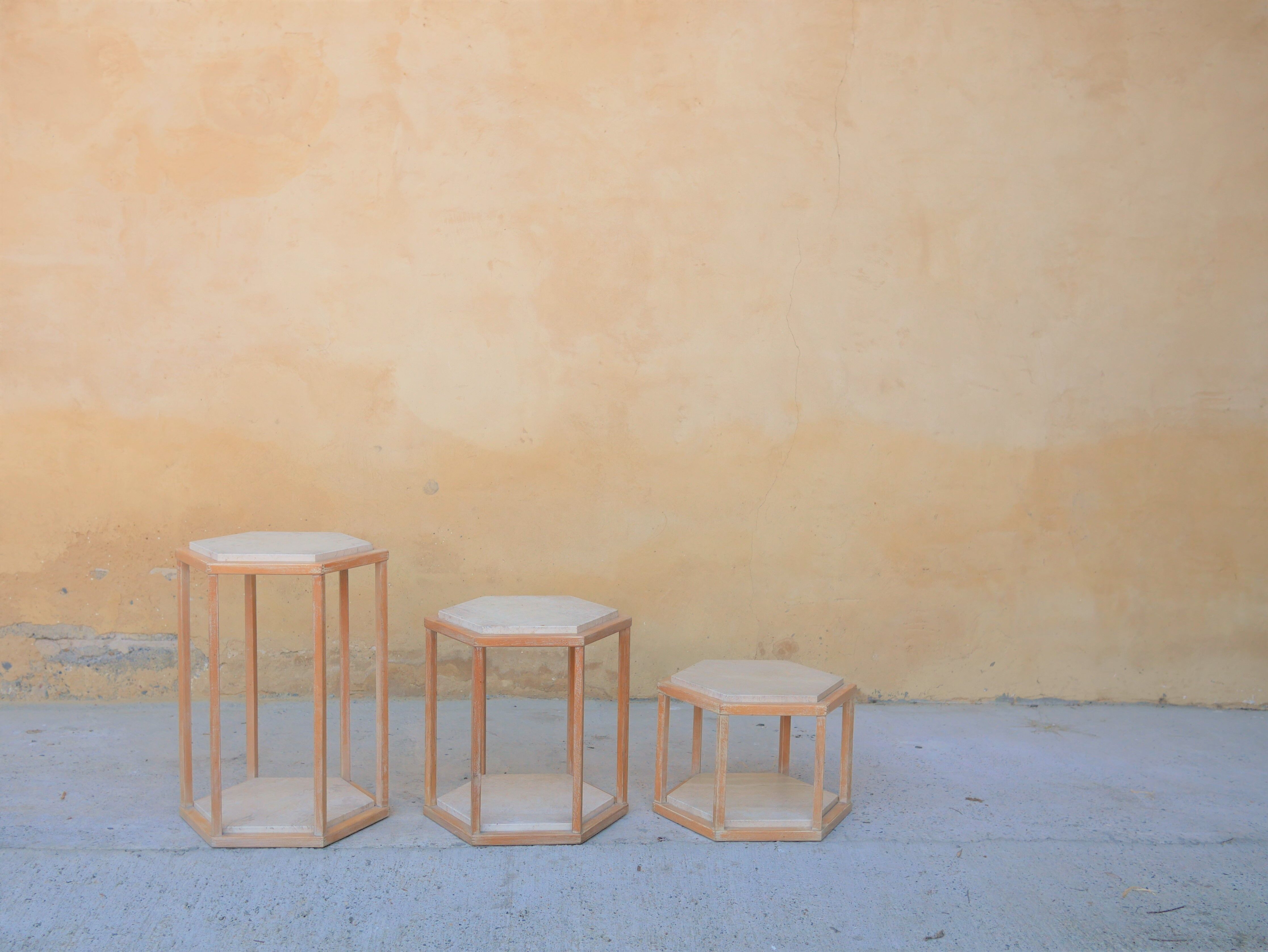 Series of 3 vintage coffee tables in travertine and wood by Roche Bobois editions