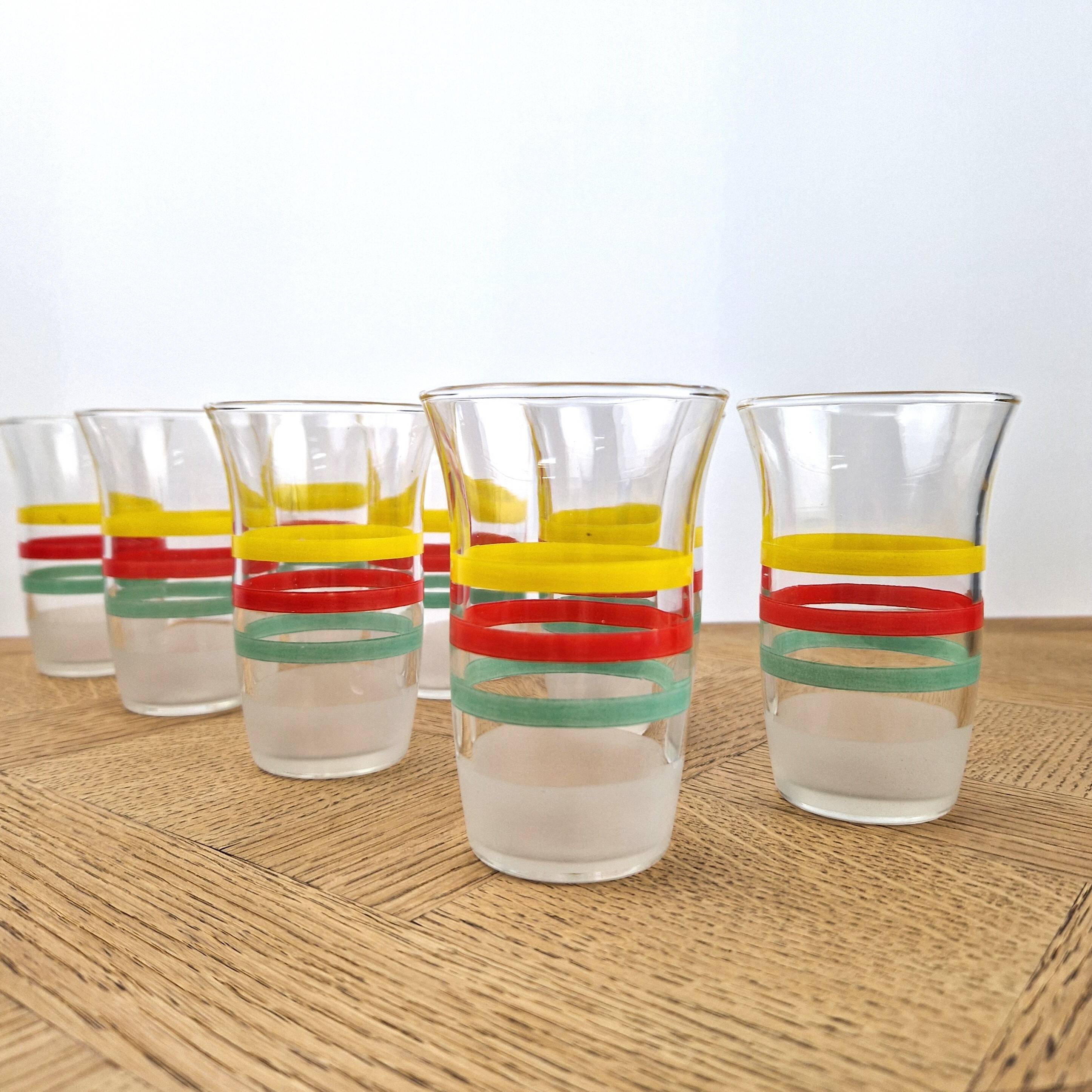 8 multicoloured vintage orangeade glasses from the 60s/70s.