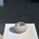 Small white ball vase tight neck in glazed speckled ceramic