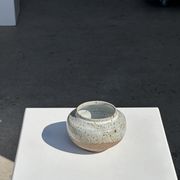 Small white ball vase tight neck in glazed speckled ceramic