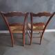 2 old straw chairs