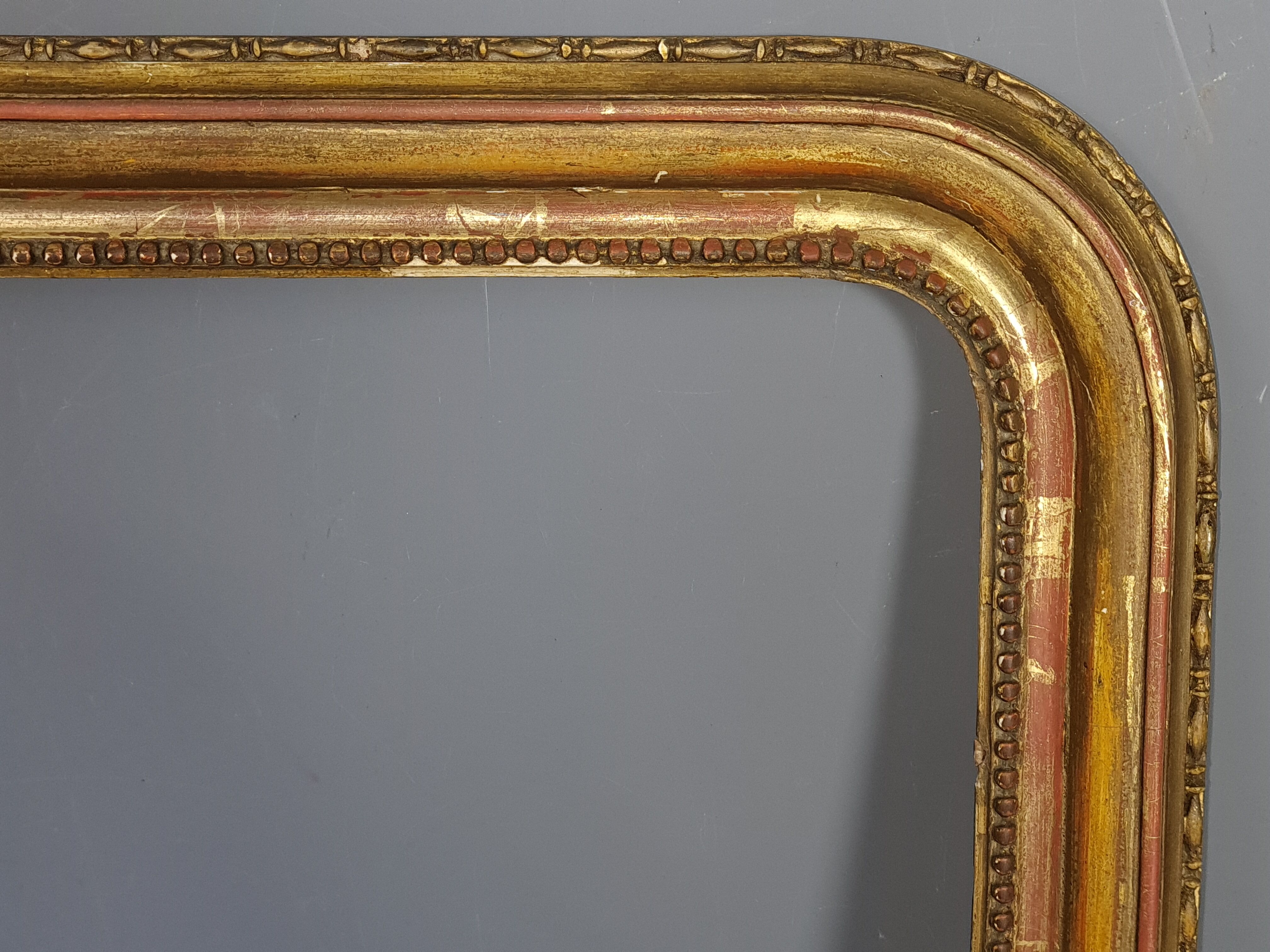 Old frame with doucine gilded stucco wood