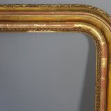 Old frame with doucine gilded stucco wood