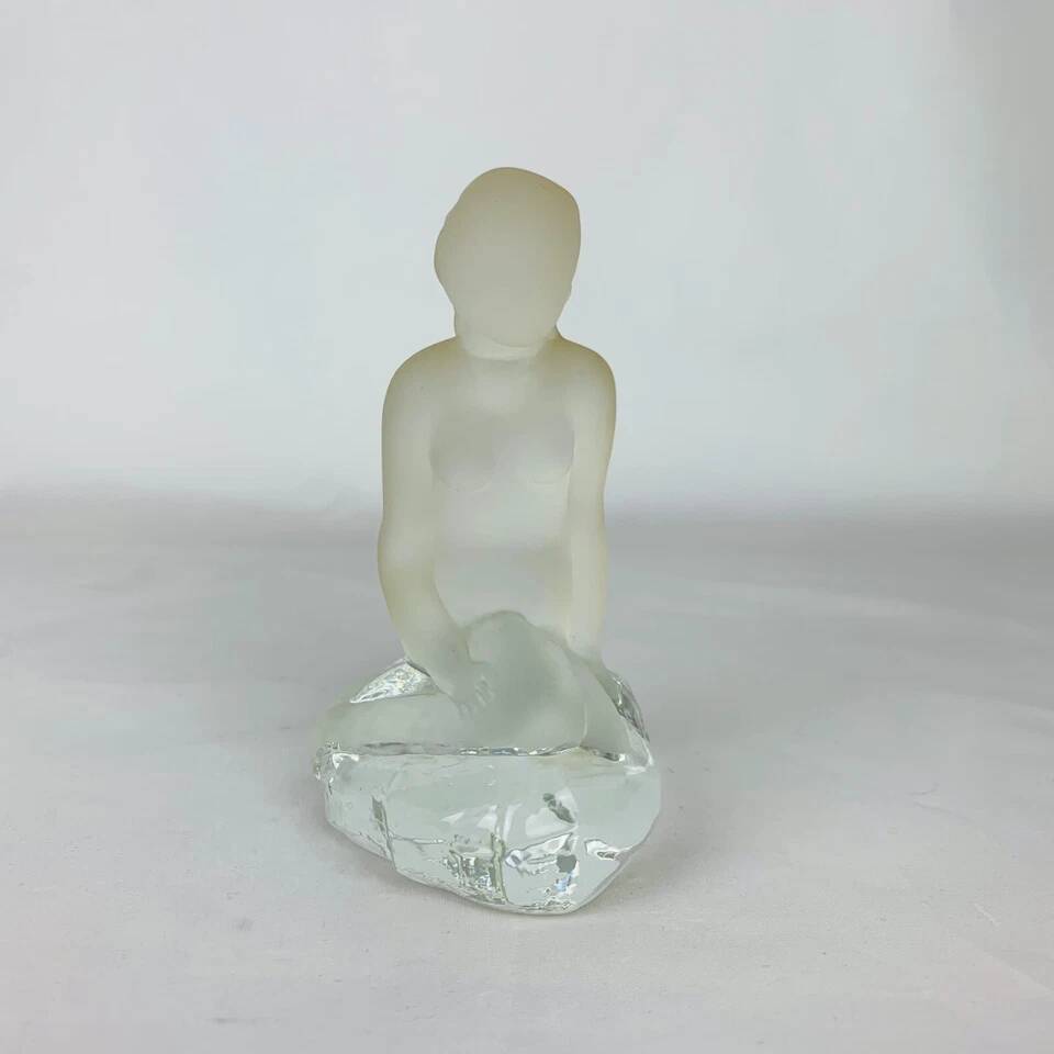 Vintage moulded glass mermaid sculpture.