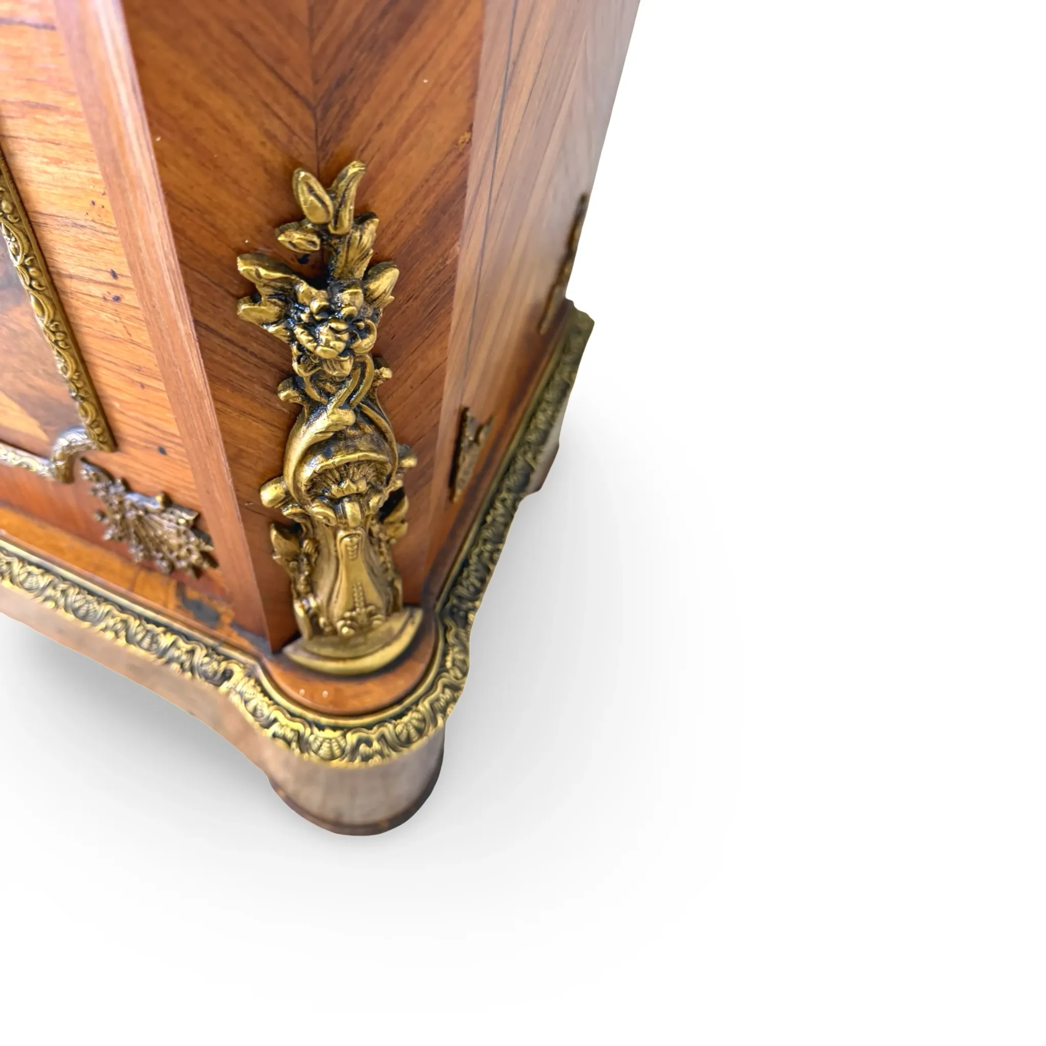 An antique French Louis XVI-style marble-top side cabinet