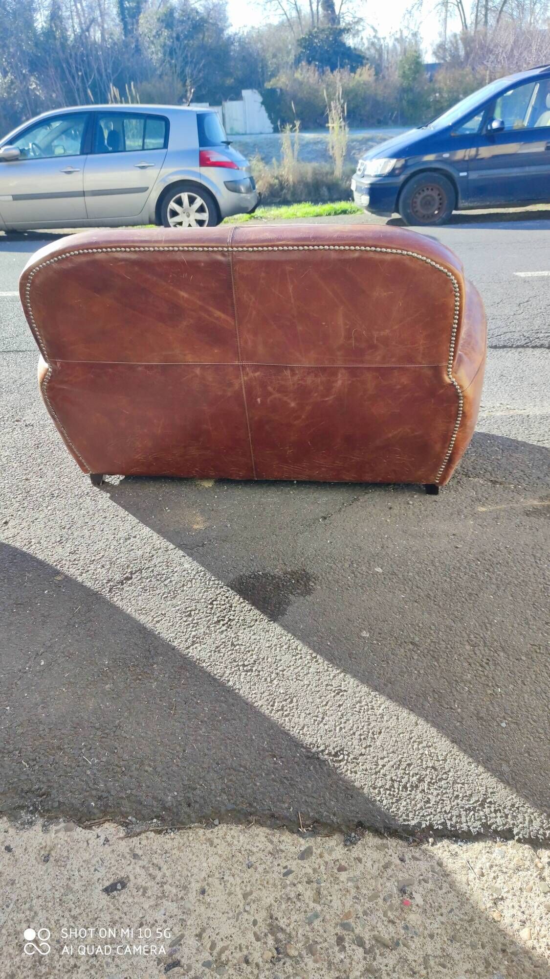 Club sofa 2 places in leather beautiful patina around 1980
