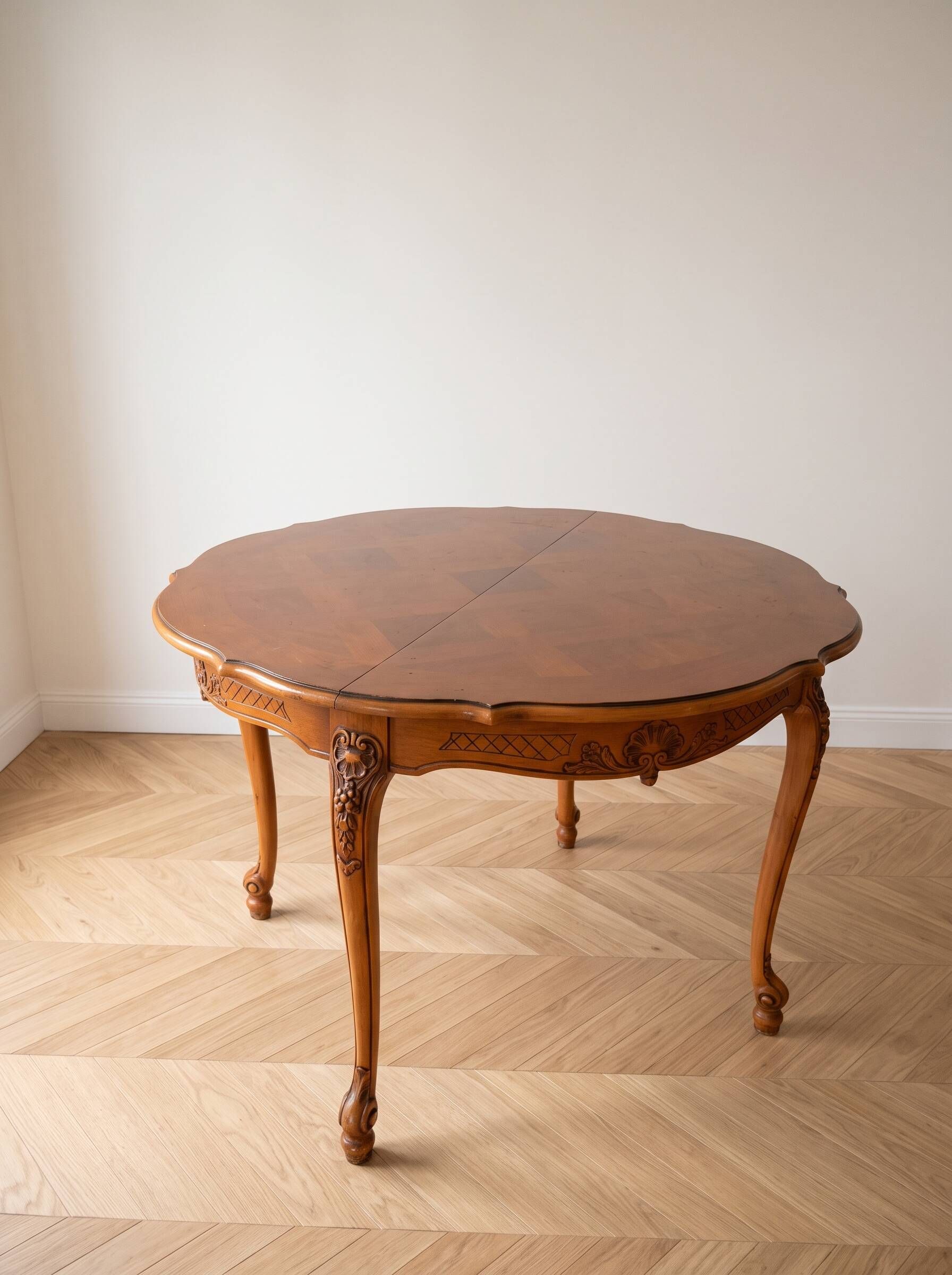 Round Louis XV dining table in solid cherry wood.