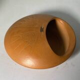 Ceramic pocket emptier