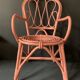 Vintage pink rattan armchair