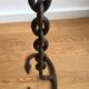 Wrought iron ashtray on its chain and anchor foot