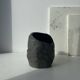 Asymmetrical sculpted concrete vase